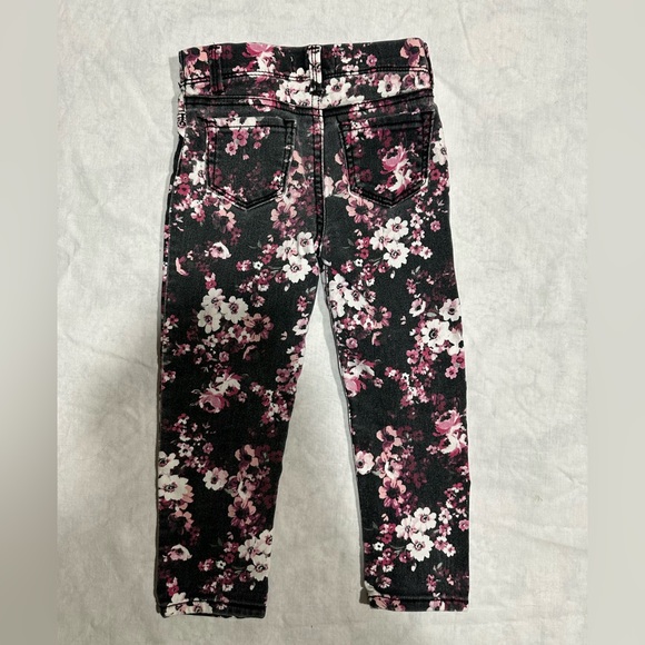 1 Jordache black with flowers jeggings and 1 pair of Cat and Jack teal jeans. - Picture 5 of 6